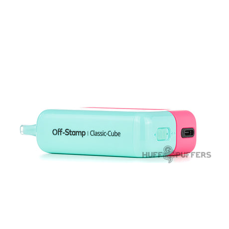 off stamp x cube disposable vape kit laying down bottom view